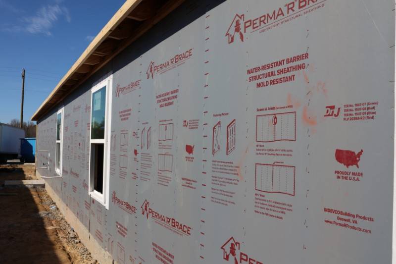 231206 Rausch House Side Wall copy